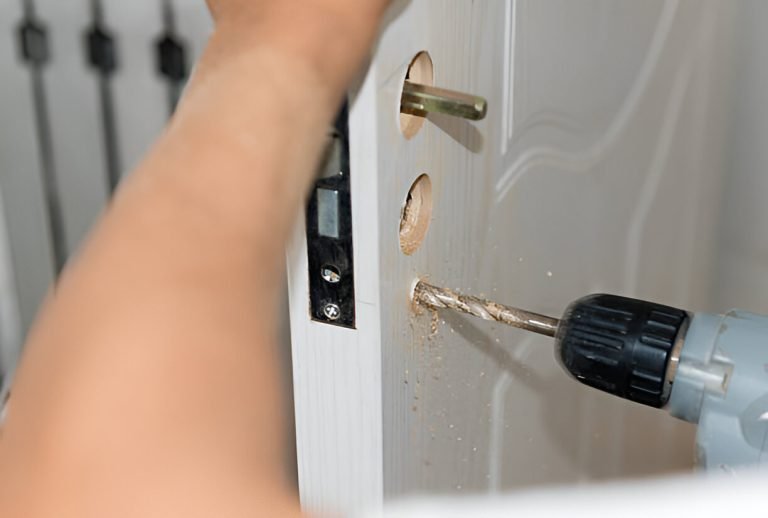 Locksmith attending a house on moving day in North London
